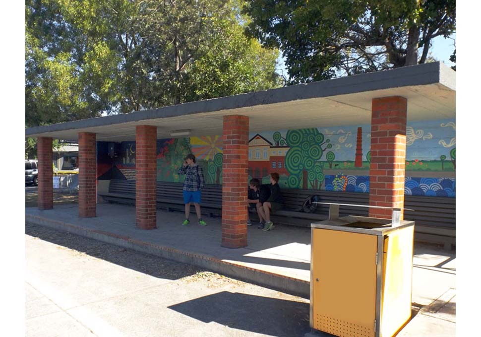 Art, students in front of mural painted at bus stop featuring brightly coloured landscape of Newmarket, by Maya Walker