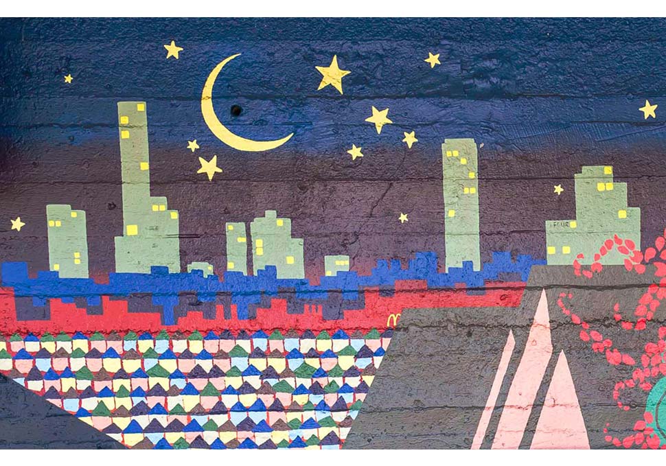 Art, detail of mural painted at bus stop featuring brightly coloured landscape of Newmarket, by Maya Walker