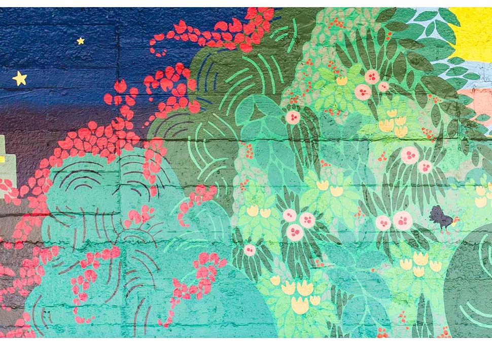 Art, detail of mural painted at bus stop featuring brightly coloured landscape of Newmarket, by Maya Walker