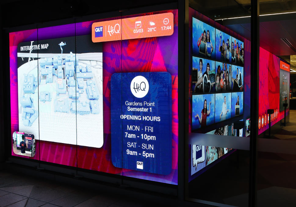 Graphic design, view from outside building of QUT HiQ Gardens Point LED wall with digital content by Maya Walker