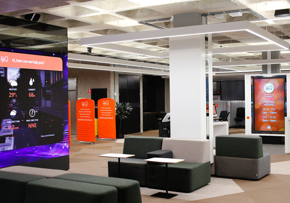 Graphic design, QUT HiQ Gardens Point space with screens showing content by Maya Walker